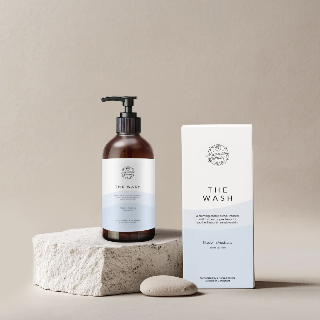 Organic baby wash and pregnancy-safe cleanser – The Wash bottle and box on stone background